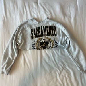 H&M Crop Sweatshirt with “Sacramento” motif at front